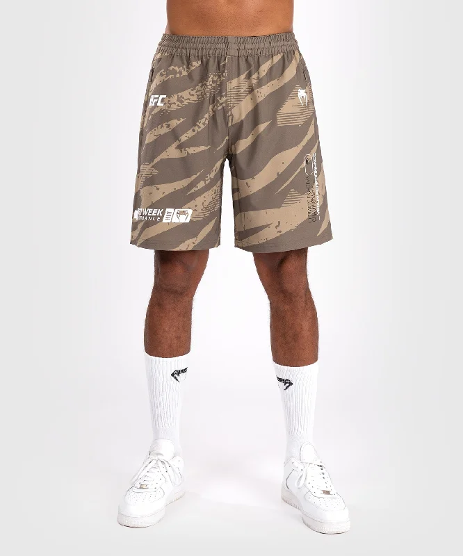 Men's zip - pocket canvas shorts for added functionality during travelShort de Performance pour Hommes UFC Adrenaline by Venum Fight Week - Desert Camo Men's zip - pocket canvas shorts for added functionality during travelShort de Performance pour Hommes UFC Adrenaline by Venum Fight Week - Desert Camo