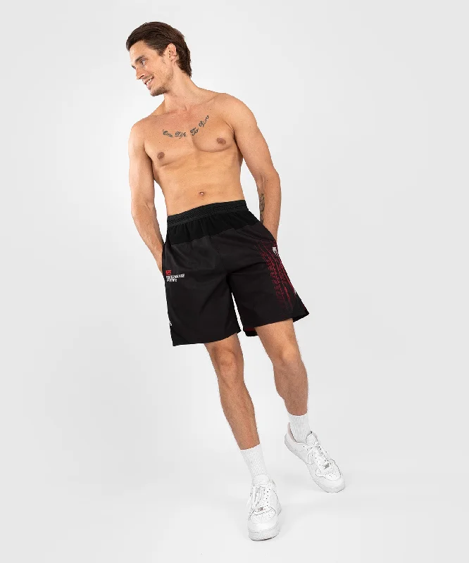 Men's pleated front twill shorts for a classic and sophisticated appearanceShort de performance pour hommes UFC Venum Performance Institute 2.0 - Noir/Rouge Men's pleated front twill shorts for a classic and sophisticated appearanceShort de performance pour hommes UFC Venum Performance Institute 2.0 - Noir/Rouge