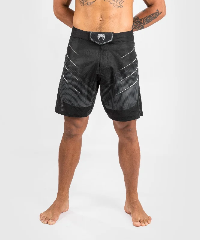 Men's side - stripe track shorts for a sporty running lookFightshort Venum Biomecha - Noir/Gris Men's side - stripe track shorts for a sporty running lookFightshort Venum Biomecha - Noir/Gris